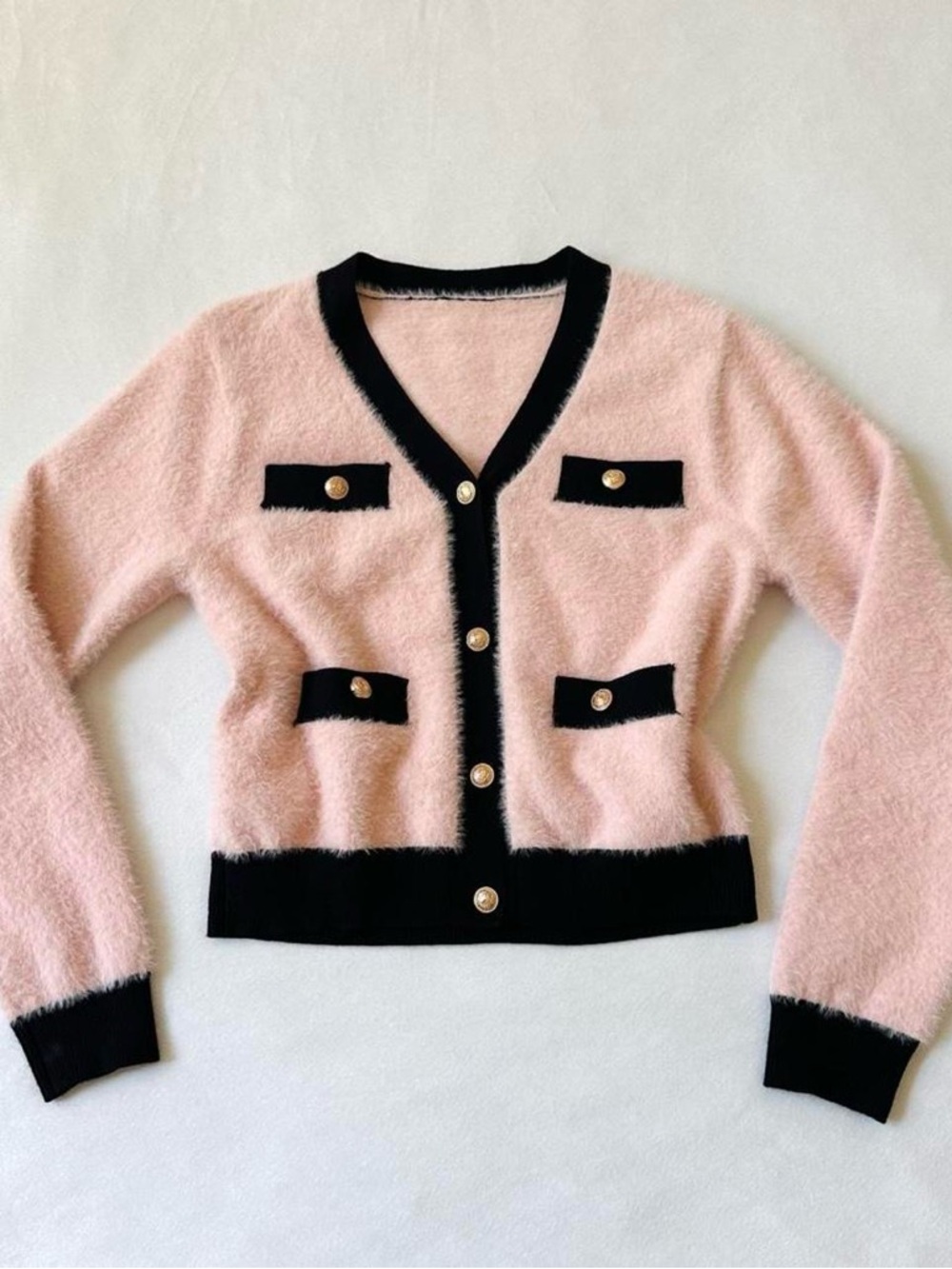 Cropped Soft Pink Cardigan with Black Trim and Gold Buttons
